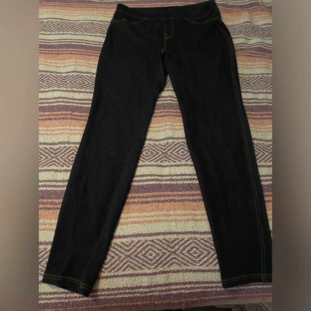Indigo jogging pocket and zipper detail in front.  Back pockets are real.